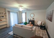 Thumbnail 13 of 42 - Photo of the living room in a 692 square foot 1 bed, 1 bath model aprtment at Cambridge Court Apartments in Dallas Texas