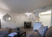 Thumbnail 23 of 40 - This is a photo of the living room and dining area of the 515 square foot 1 bedroom apartment at Canyon Creek Apartments in Dallas, TX