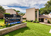 Thumbnail 34 of 40 - A sign for Canyon Creek Apartments at Canyon Creek Apartments Apartments in the Dallas Midtown neighborhood of Dallas, TX.