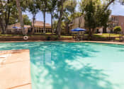 Thumbnail 13 of 40 - This is a photo of the pool area at Canyon Creek Apartments in Dallas, TX.