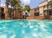 Thumbnail 12 of 40 - This is a photo of the pool area at Canyon Creek Apartments in Dallas, TX.