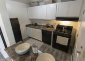 Thumbnail 1 of 35 - This is a photo of the kitchen in the 740 square foot 1 bedroom model apartment at Compton Lake Apartments in Mt. Healthy, OH.