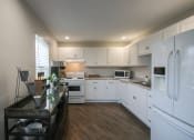 Thumbnail 24 of 35 - This is a photo of the kitchen in the resident clubhouse at Compton Lake Apartments in Mt. Healthy, OH.