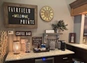 Thumbnail 71 of 74 - A coffee bar with a sign that says "Fairfield Welcome Pointe".