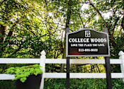 Thumbnail 56 of 62 - This is a photo of the entrance sign at College Woods Apartments in Cincinnati, OH.