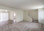Thumbnail 45 of 71 - This is a photo of the living room of the 1004 square foot, 2 bedroom/1 bath Townhome with stackable washer/dryer floor plan at Colonial Ridge Apartments in the Pleasant Ridge neighborhood of Cincinnati, OH.