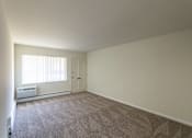 Thumbnail 14 of 71 - This is a photo of the living room in the 631 square foot, B-style (Ranch) 1 bedroom/1 bath floor plan at Colonial Ridge Apartments in the Pleasant Ridge neighborhood of Cincinnati, OH.