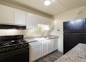 Thumbnail 27 of 62 - This is a photo of the kitchen in the 550 square foot 1 bedroom, 1 bath patio apartment at College Woods Apartments in the North College Hill neighborhood of Cincinnati, OH.
