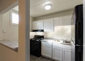 Thumbnail 6 of 62 - This is a photo of the kitchen in the 550 square foot 1 bedroom, 1 bath patio apartment at College Woods Apartments in the North College Hill neighborhood of Cincinnati, OH.