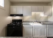 Thumbnail 5 of 62 - This is a photo of the kitchen in the 550 square foot 1 bedroom, 1 bath patio apartment at College Woods Apartments in the North College Hill neighborhood of Cincinnati, OH.