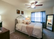Thumbnail 23 of 62 - This is a photo of the bedroom of the 550 square foot 1 bedroom, 1 bath, balcony floor plan model apartment at College Woods Apartments in Cincinnati, OH.
