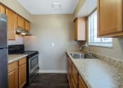 Thumbnail 9 of 77 - This is a photo of the kitchen of an upgraded 650 square foot, 1 bedroom apartment at Deer Hill Apartments in Cincinnati, OH.