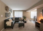 Thumbnail 32 of 77 - This is a photo of the living room in the upgraded 650 square foot, 1 bedroom, 1 bath model apartment at Deer Hill Apartments in Cincinnati, Ohio.