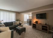 Thumbnail 31 of 77 - This is a photo of the living room in the upgraded 650 square foot, 1 bedroom, 1 bath model apartment at Deer Hill Apartments in Cincinnati, Ohio.