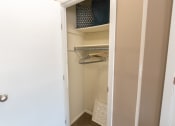 Thumbnail 62 of 77 - This is a photo of the living room closet in the upgraded 650 square foot, 1 bedroom model apartment at Deer Hill Apartments in Cincinnati, Ohio.