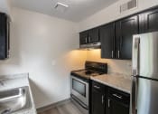 Thumbnail 3 of 77 - This is a photo of the kitchen in an upgraded 950 square foot, 2 bedroom apartment at Deer Hill Apartments in Cincinnati, OH.