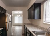 Thumbnail 4 of 77 - This is a photo of the kitchen in an upgraded 950 square foot, 2 bedroom apartment at Deer Hill Apartments in Cincinnati, OH.