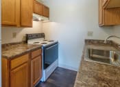 Thumbnail 20 of 77 - This is a photo of the kitchen in a 950 square foot, standard 2 bedroom apartment at Deer Hill Apartments in Cincinnati, OH.