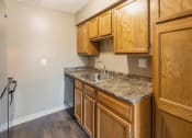 Thumbnail 17 of 77 - This is a photo of the kitchen of an upgraded 950 square foot, 2 bedroom apartment at Deer Hill Apartments in Cincinnati, OH.