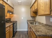Thumbnail 16 of 77 - This is a photo of the kitchen of an upgraded 950 square foot, 2 bedroom apartment at Deer Hill Apartments in Cincinnati, OH.
