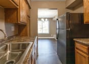 Thumbnail 14 of 77 - This is a photo of the kitchen of an upgraded 950 square foot, 2 bedroom apartment at Deer Hill Apartments in Cincinnati, OH.