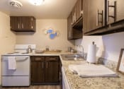 Thumbnail 2 of 74 - Granite Countertop Kitchen at Fairfield Pointe, Fairfield