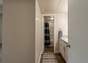 Thumbnail 23 of 43 - This is a photo of the primary bathroom in the 965 square foot 2 bedroom, 2 bath  apartment at Harvard Square Apartments, in Dallas, TX.