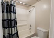 Thumbnail 25 of 43 - This is a photo of the primary bathroom in the 965 square foot 2 bedroom, 2 bath  apartment at Harvard Square Apartments, in Dallas, TX.