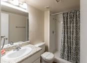Thumbnail 27 of 43 - This is a photo of the bathroom in the 965 square foot 2 bedroom, 2 bath  apartment at Harvard Square Apartments, in Dallas, TX.