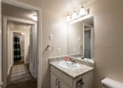 Thumbnail 28 of 43 - This is a photo of the bathroom in the 965 square foot 2 bedroom, 2 bath  apartment at Harvard Square Apartments, in Dallas, TX.