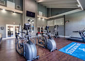 Thumbnail 47 of 62 - The 24-hour fitness center at The Biltmore Apartments located in the Vickery Midtown neighborhood of Dallas, TX.