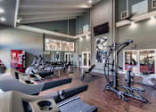 Thumbnail 48 of 62 - The 24-hour fitness center at The Biltmore Apartments located in the Vickery Midtown neighborhood of Dallas, TX.