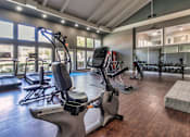 Thumbnail 49 of 62 - The 24-hour fitness center at The Biltmore Apartments located in the Vickery Midtown neighborhood of Dallas, TX.