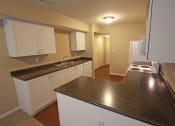 Thumbnail 18 of 75 - This is a photo of the kitchen in the 1490 square foot 3 bedroom Presidential at Washington Place Apartments in Washington Township, OH.