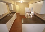 Thumbnail 17 of 75 - This is a photo of the kitchen in the 1490 square foot 3 bedroom Presidential at Washington Place Apartments in Washington Township, OH.