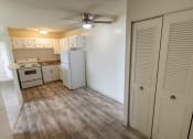 Thumbnail 4 of 44 - This is a photo of the kitchen and entryway closet in the 545 square foot 1 bedroom, 1 bath apartment at Lisa Ridge Apartments in the Westwood neighborhood of Cincinnati, Ohio.