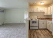 Thumbnail 5 of 44 - This is a photo of the kitchen and living room in the 545 square foot 1 bedroom, 1 bath apartment at Lisa Ridge Apartments in the Westwood neighborhood of Cincinnati, Ohio.