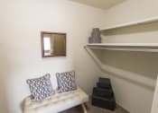 Thumbnail 24 of 44 - This is a photo of the primary bedroom walk-in closet in the 705 square foot 2 bedroom, 1 bath apartment at Lisa Ridge Apartments in the Westwood neighborhood of Cincinnati, Ohio.