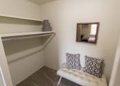 Thumbnail 23 of 44 - This is a photo of the primary bedroom walk-in closet in the 705 square foot 2 bedroom, 1 bath apartment at Lisa Ridge Apartments in the Westwood neighborhood of Cincinnati, Ohio.