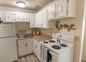 Thumbnail 1 of 44 - This is a photo of the kitchen in the 705 square foot 2 bedroom, 1 bath apartment at Lisa Ridge Apartments in the Westwood neighborhood of Cincinnati, Ohio.