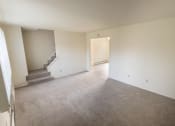 Thumbnail 24 of 56 - This is a photo of the living room in the 1004 square foot, 2 bedroom, 1.5 bath townhome floor plan at Lake of the Woods Apartments in Cincinnati, OH.