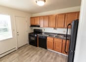 Thumbnail 4 of 56 - This is a photo of the kitchen in the 1004 square foot, 2 bedroom, 1.5 bath townhome floor plan at Lake of the Woods Apartments in Cincinnati, OH.