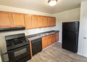Thumbnail 6 of 56 - This is a photo of the kitchen in the 1004 square foot, 2 bedroom, 1.5 bath townhome floor plan at Lake of the Woods Apartments in Cincinnati, OH.