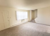 Thumbnail 29 of 56 - This is a photo of the living room in the 1004 square foot, 2 bedroom, 1.5 bath townhome floor plan at Lake of the Woods Apartments in Cincinnati, OH.