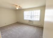 Thumbnail 31 of 56 - This is a photo of the primary bedroom in the 1004 square foot, 2 bedroom, 1.5 bath townhome floor plan at Lake of the Woods Apartments in Cincinnati, OH.