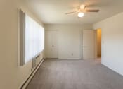 Thumbnail 32 of 56 - This is a photo of the primary bedroom in the 1004 square foot, 2 bedroom, 1.5 bath townhome floor plan at Lake of the Woods Apartments in Cincinnati, OH.