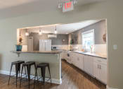 Thumbnail 37 of 56 - This is a photo of the kitchen in the resident clubhouse at Lake of the Woods Apartments in Cincinnati, OH.