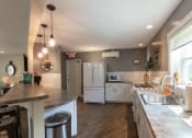 Thumbnail 39 of 56 - This is a photo of the kitchen in the resident clubhouse at Lake of the Woods Apartments in Cincinnati, OH.