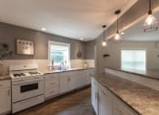 Thumbnail 41 of 56 - This is a photo of the kitchen in the resident clubhouse at Lake of the Woods Apartments in Cincinnati, OH.