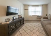 Thumbnail 15 of 56 - This is a photo of the living room of the 1 bedroom, 631 square foot model apartment at Lake of the Woods Apartments in Cincinnati, OH.